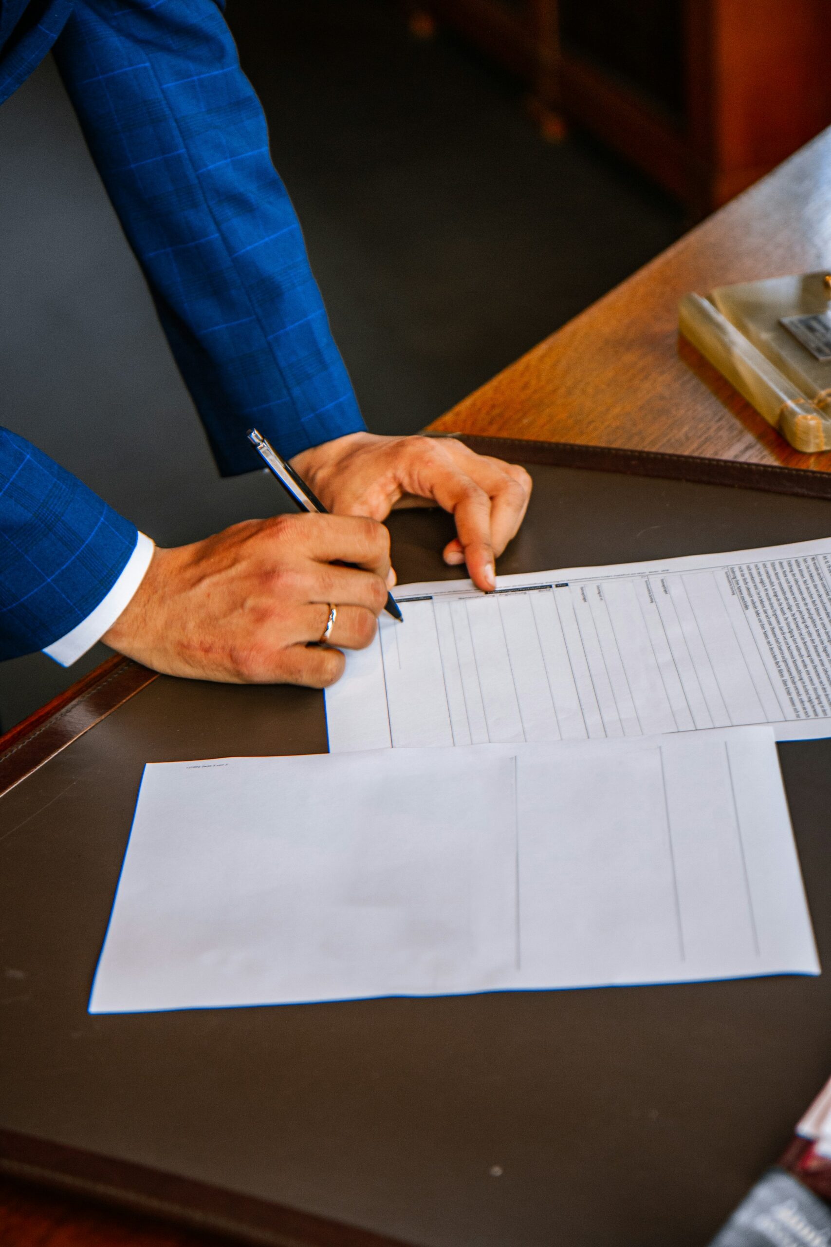 a lawyer signing the agreements. a lawyer signing the agreements.